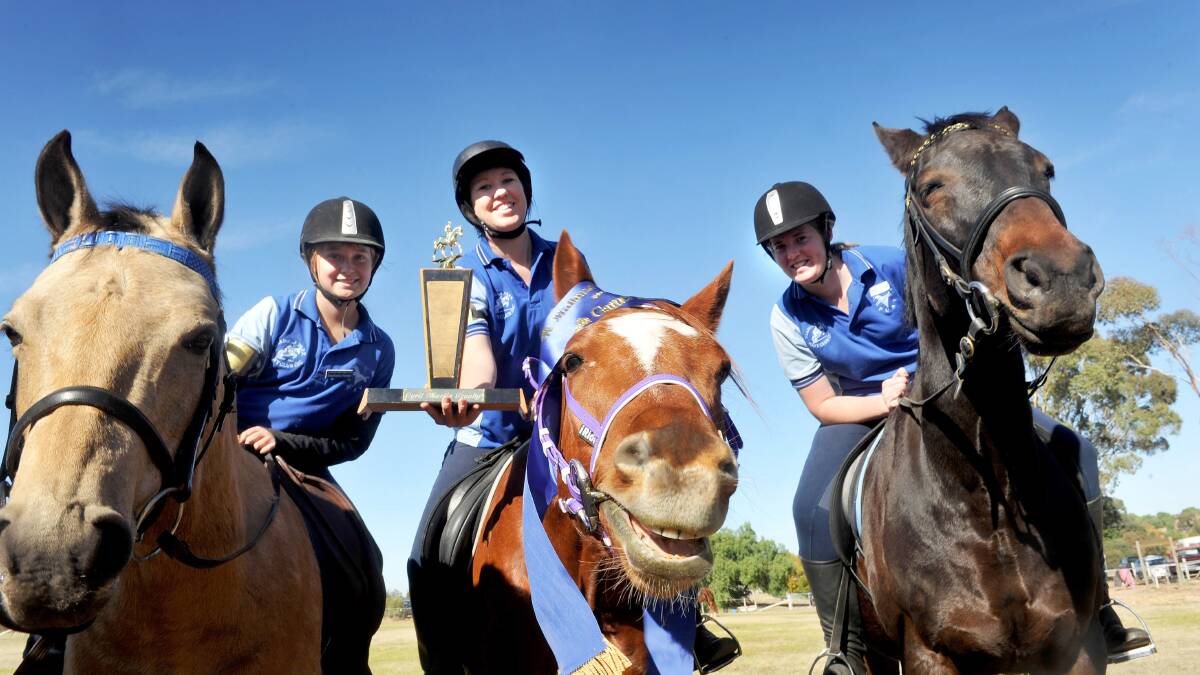 Neangar Park Pony Club has qualified for state championships after winning the Midlland Zone Games team event at Bealiba.
Stephanie Horton, Niomi Baxter and Trista Hoyland with the winning trophy
Pic Julie Hough 05.05.13