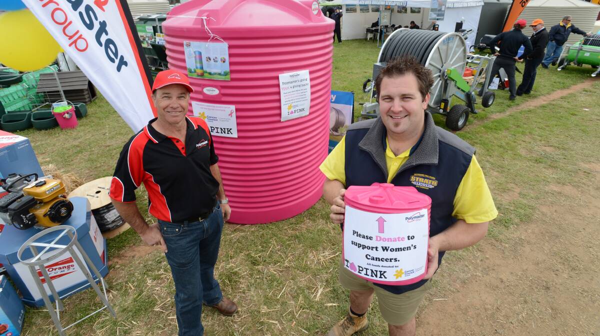 Stuart Brumby from Polymaster and Kurt Ross from Strath Hardware with the Pink Tank that will be auctioned off, at day two of the Elmore Field Days.

Picture: JIM ALDERSEY