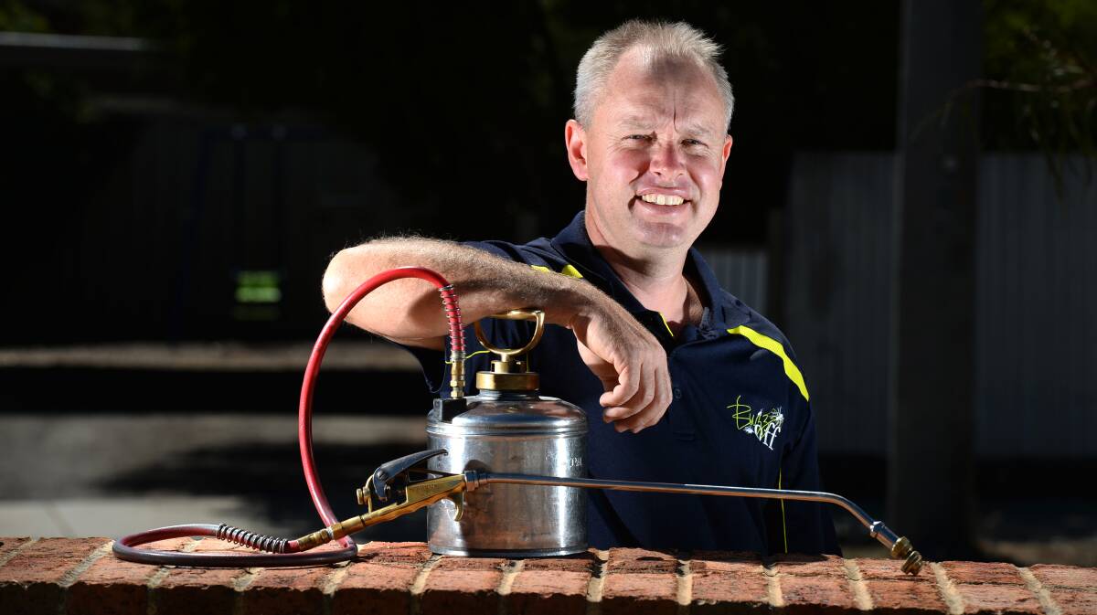 Busy: Mark Edwards from Buzz Off - Bendigo Pest Professionals. Picture: JIM ALDERSEY