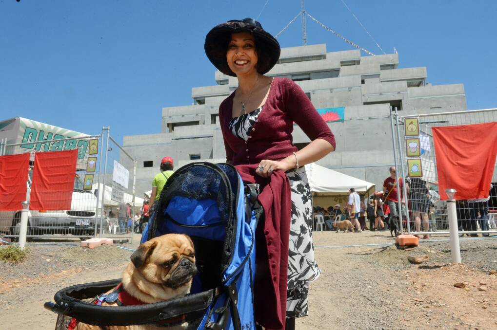 WOOF: 'Razzle' and his owner Danielle Archer enjoy the festival.
Picture: Brendan McCarthy
