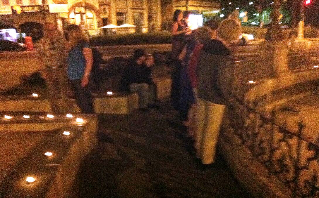 TRIBUTE: People light candles to remember Patiya. Picture: CONTRIBUTED