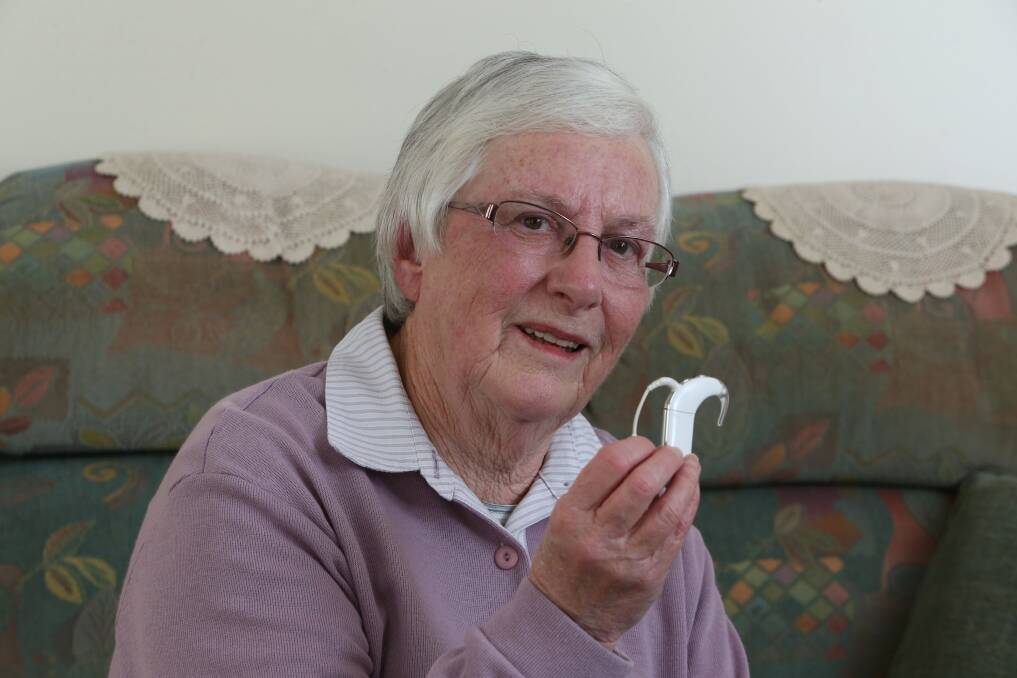 SATISFIED: Wendy Hawke with her hearing device. Picture: PETER WEAVING