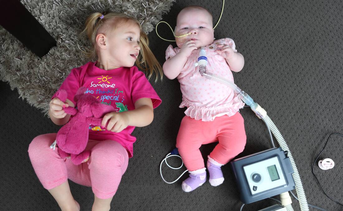 Baby Evie with her sister Isabella. Picture: PETER WEAVING