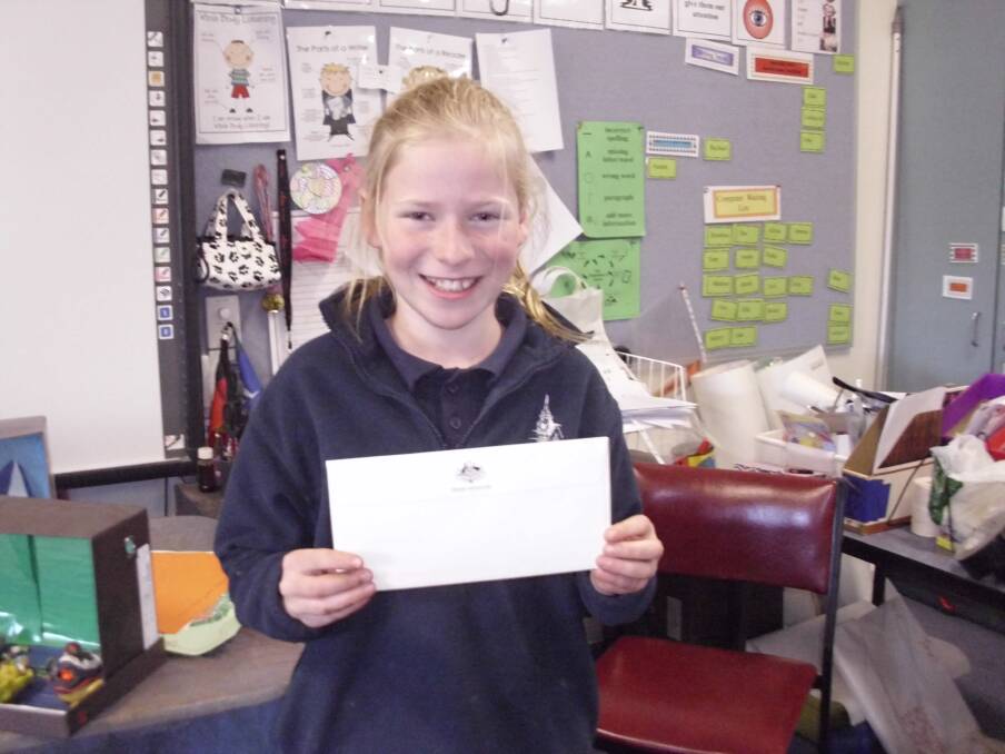 EXCITED: Rachael Hamilton with her letter from Tony Abbott. Picture: CONTRIBUTED