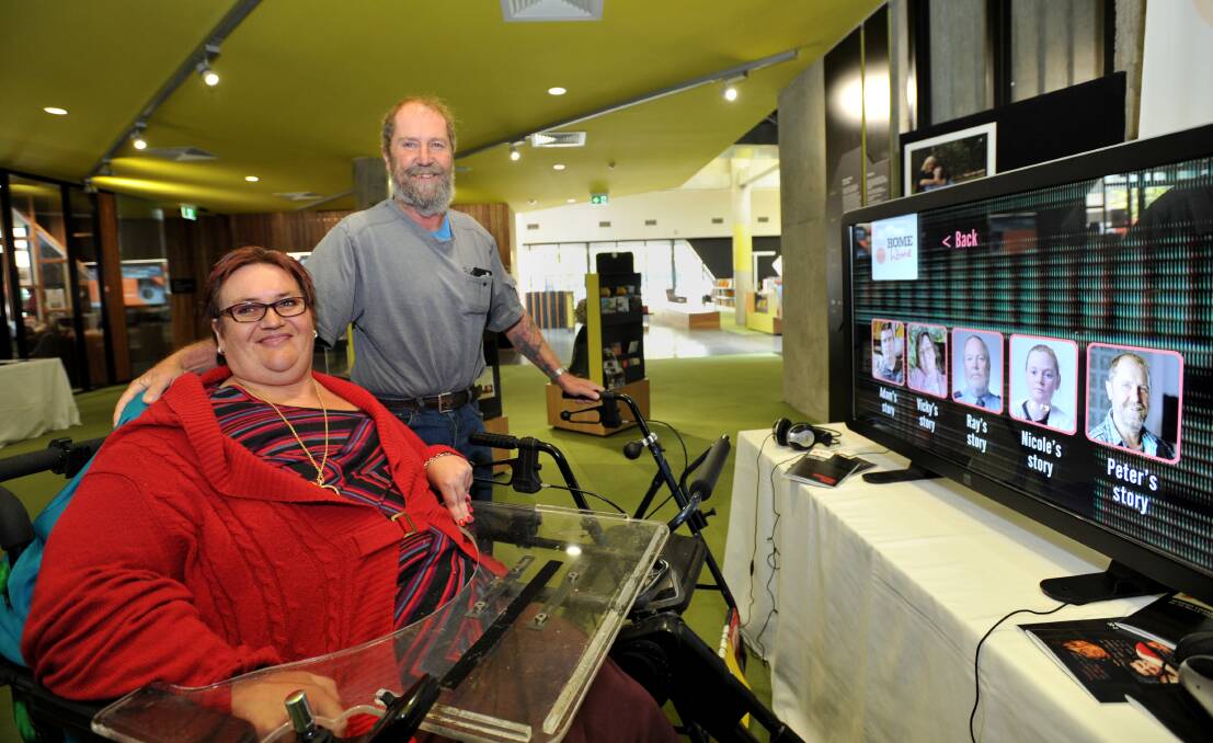 PROUD: Vicky Smith and Peter Szentirmay visit the Digital Story Exhibition at the Bendigo Library. Pictures: JODIE DONNELLAN 
