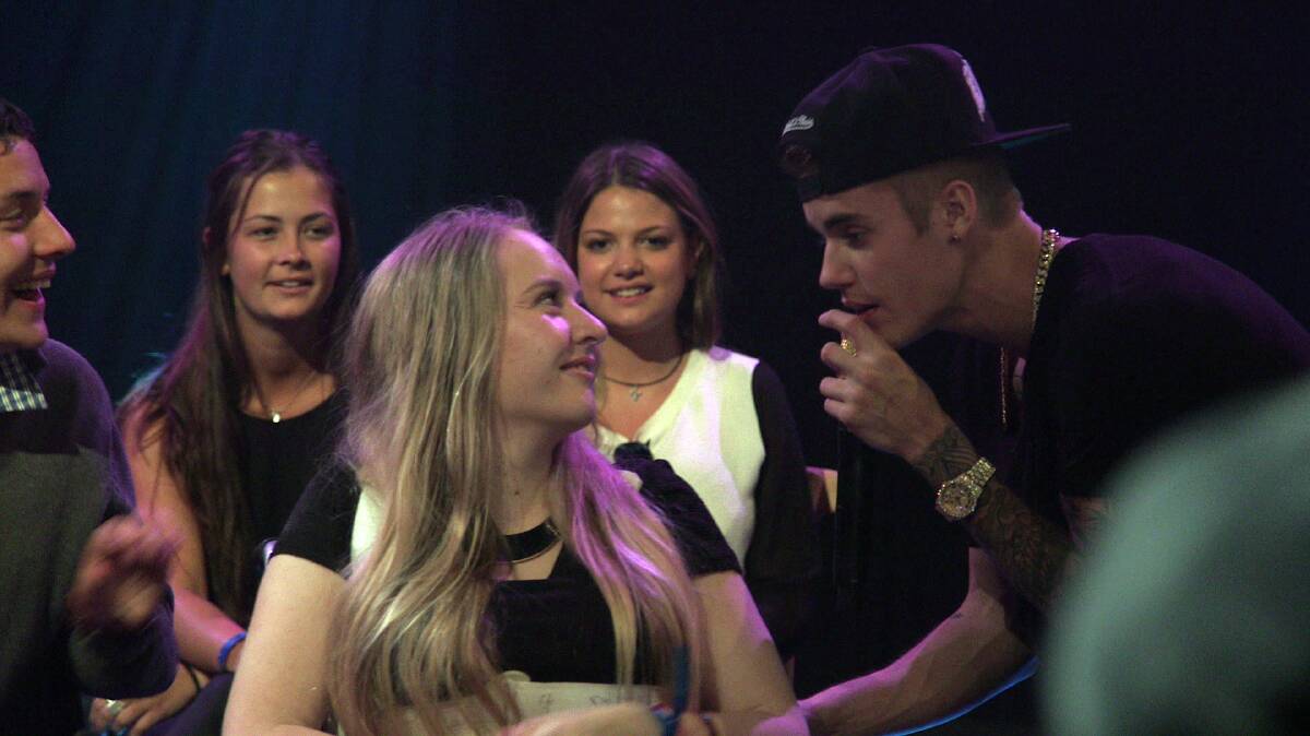 DEVOTED: Kate O'Neill with pop star Justin Bieber. Picture: CONTRIBUTED