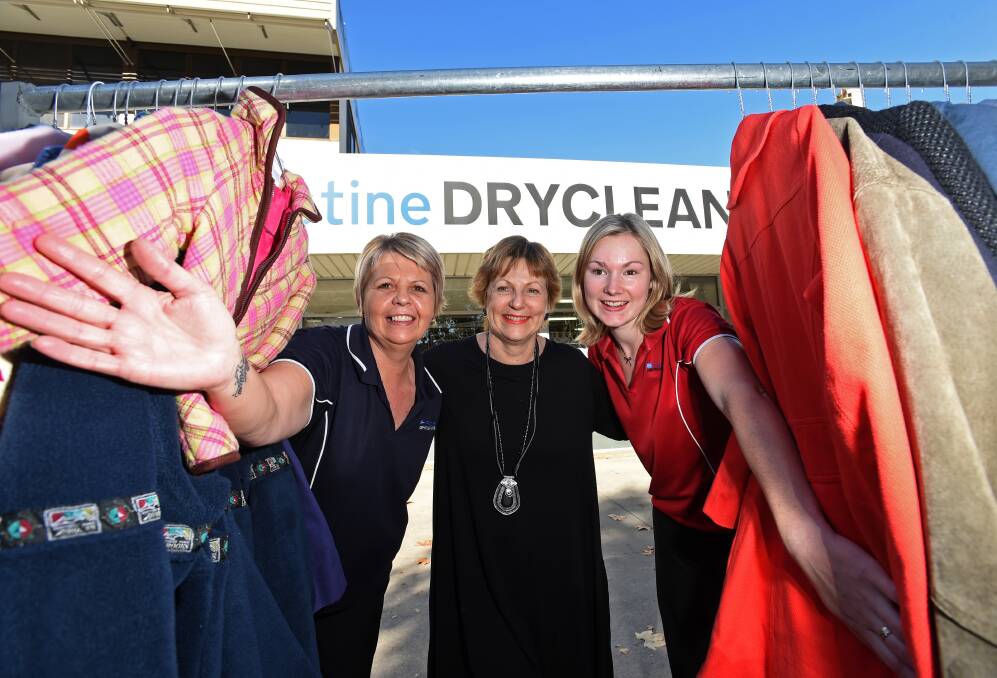 WARM: Bendigo Community Health Services chief executive Kim Sykes, middle, with Pristine Dry Cleaners managers Jane Townsend and Sarah Richards. Picture: JODIE DONNELLAN