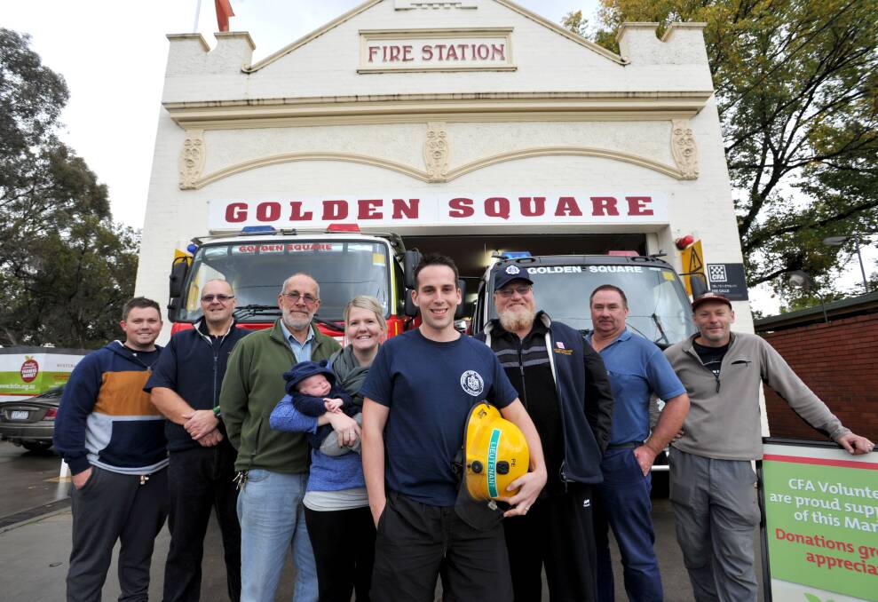 VOLUNTEERS: Bryan Greenwood, Paul Davis, Geoff Turpie, Lacey McNeilly with 3 week old Harrison, Tim McNeilly, Rick Clayton, Russell Peters and Chris Corr. Picture: JODIE DONNELLAN 
