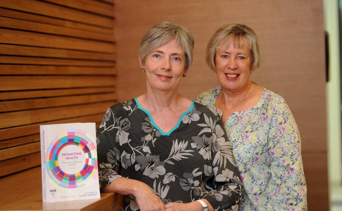 PROUD: Authors Dr Glenda Verrinder and Dr Lyn Talbot. Picture: JODIE DONNELLAN 
