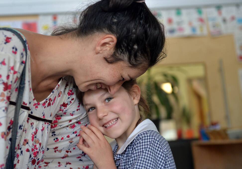 Preps first day at St Mary's Primary in Castlemaine. Mum Sarah Squire says goodbye to daughter Paige. 
Picture: BRENDAN McCARTHY
