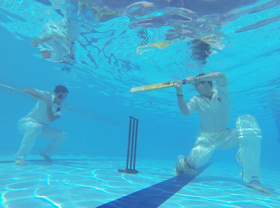 White Hills cricketers Rhys Irwin and Gareth Davies cooling off at the bottom of the Brennan Park swimming pool. The cricket is expected to be called off this weekend due to the hot weather. Picture: JIM ALDERSEY