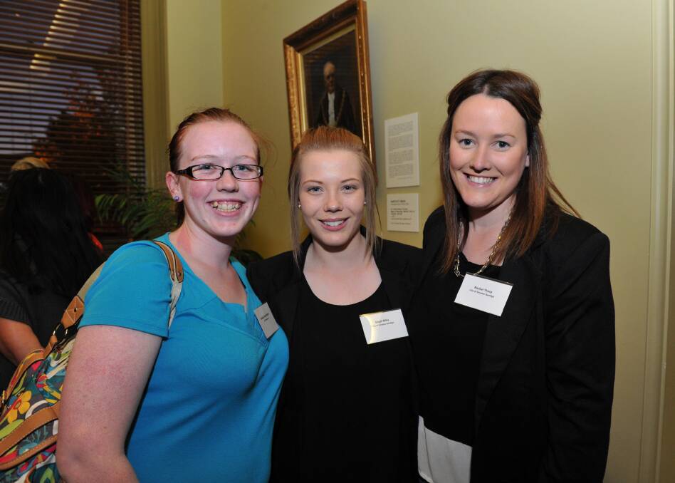 Bendigo Easter Festival volunteer Isabella Welton with Steph Mika and Rachel Thorp from the City of Greater Bendigo. 