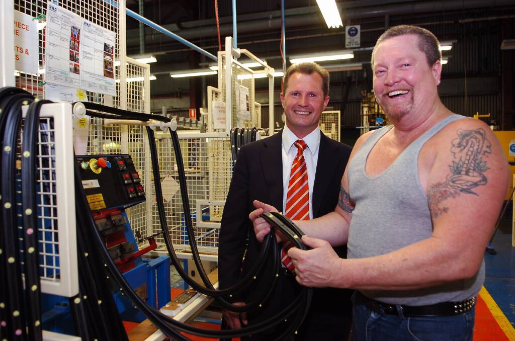 New managing director of Empire Rubber, John Schulz chats to worker, Shane Young.
pic: Laura Scott