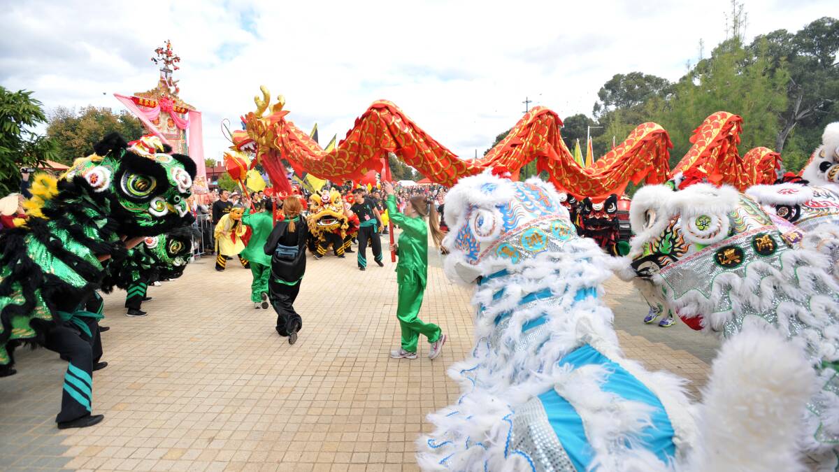 Dragons, Lions and Chinese dancers exit the Golden Dragon Museum on their way to View st before the parade.

Picture: JIM ALDERSEY