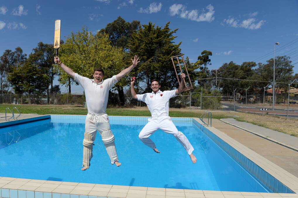White Hills cricketers Gareth Davies and Rhys Irwin cooling off at the bottom of the Brennan Park swimming pool. The cricket is expected to be called off this weekend due to the hot weather. Picture: JIM ALDERSEY