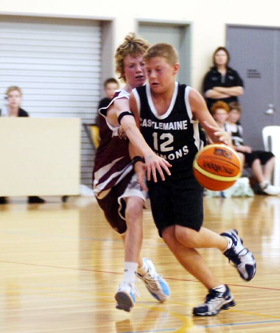 12 B2 basketball at the Schweepes centre tournament.
Wodonga Bulldogs  V  Castlemaine.
Number 12 for C/Maine is Andrew Stephens.
Pic by Andrew Perryman on Thur 26th Jan 2006.