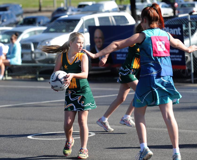 Stephanie Milsom plays for St Killians during the School Championships at the Golden City netball courts. Picture: Jodie Donnellan