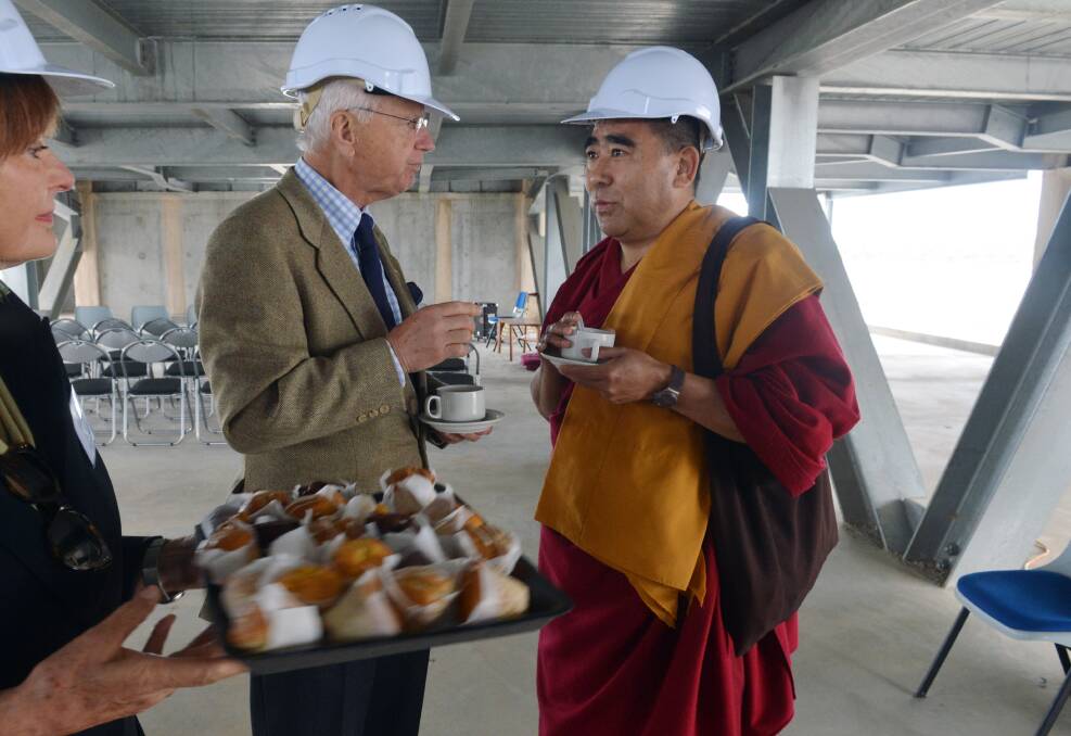 Governor Alex Chernov chats with Venerable Khedup on a visit to Bendigo's Great Stupa.  Picture: BRENDAN MCCARTHY