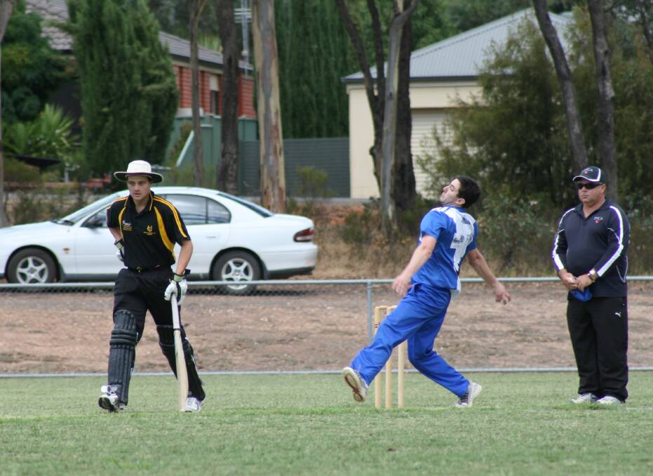 United's Josh Filo & Marong's Adam Brown (bowler). Picture: Kylie Ross