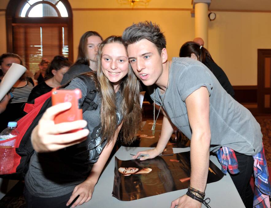 Ashlie Sellears takes a 'selfie' with Taylor Henderson. 