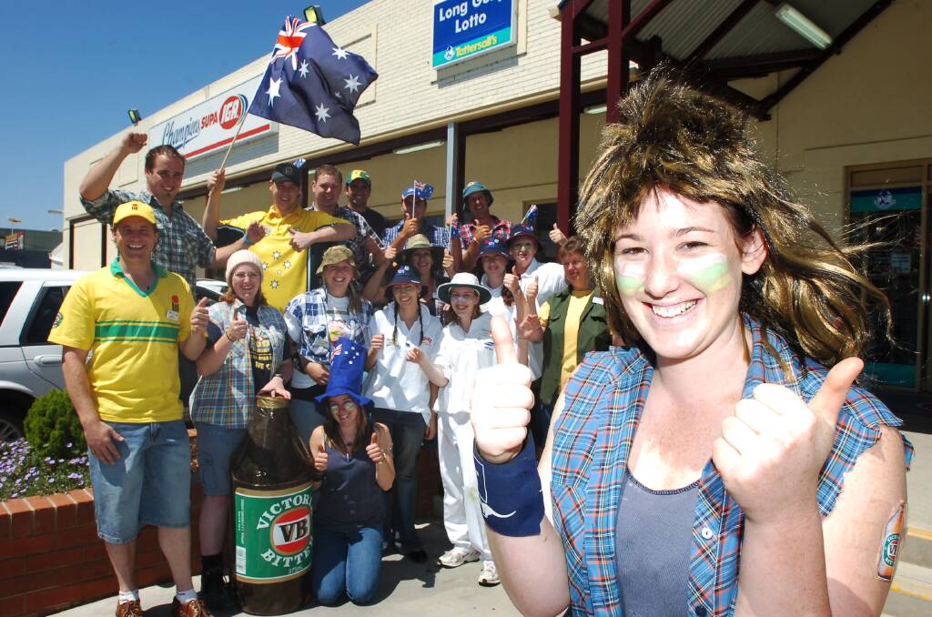 Erin Atkins with some of the crew from Champions IGA  dress in their Aussie Gear for  AUSTRALIA Day.
pic by Andrew Perryman on  Wed 25th Jan 2006.