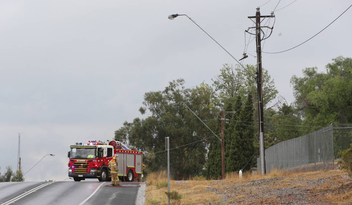 OUT: A power pole that caught alight on Chum Street. Picture: PETER WEAVING 