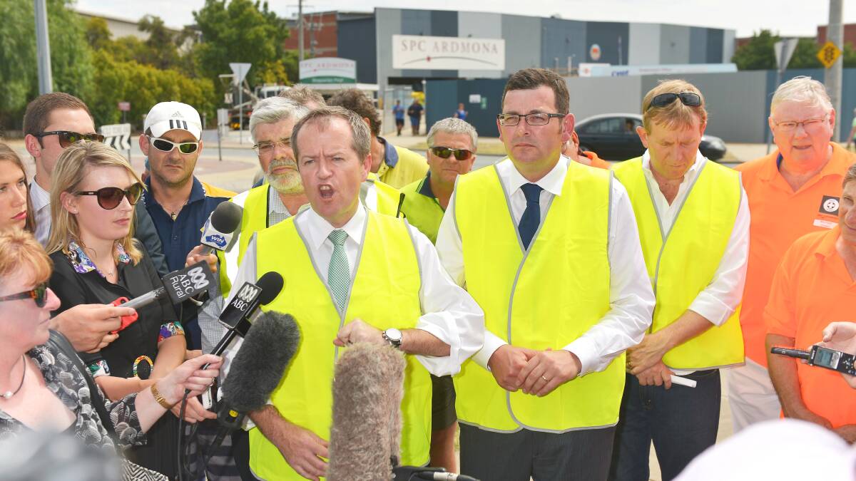 Leader of the federal Labor party Bill Shorten, Victorian Labor leader Daniel Andrews and Senator Kim Carr visit the SPC Ardmona factory in Shepparton. Picture: JOE ARMAO