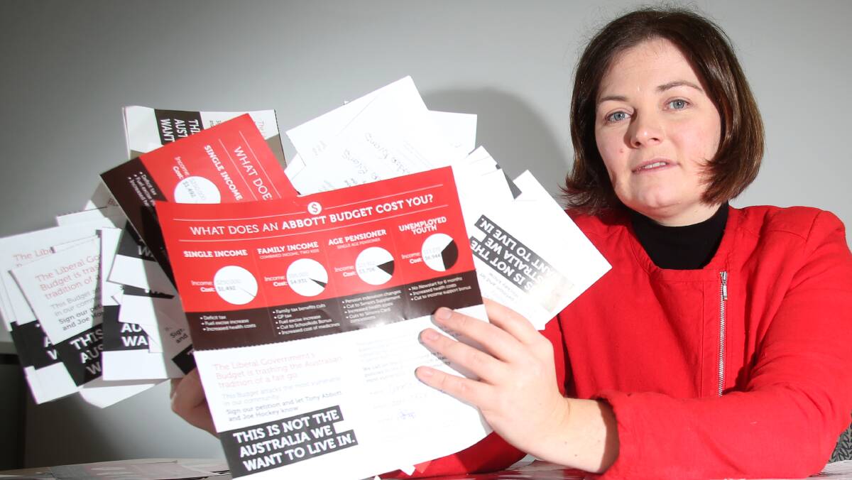 CONCERNS: Lisa Chesters with 1000 petitions opposing the Federal Budget. Picture: GLENN DANIELS