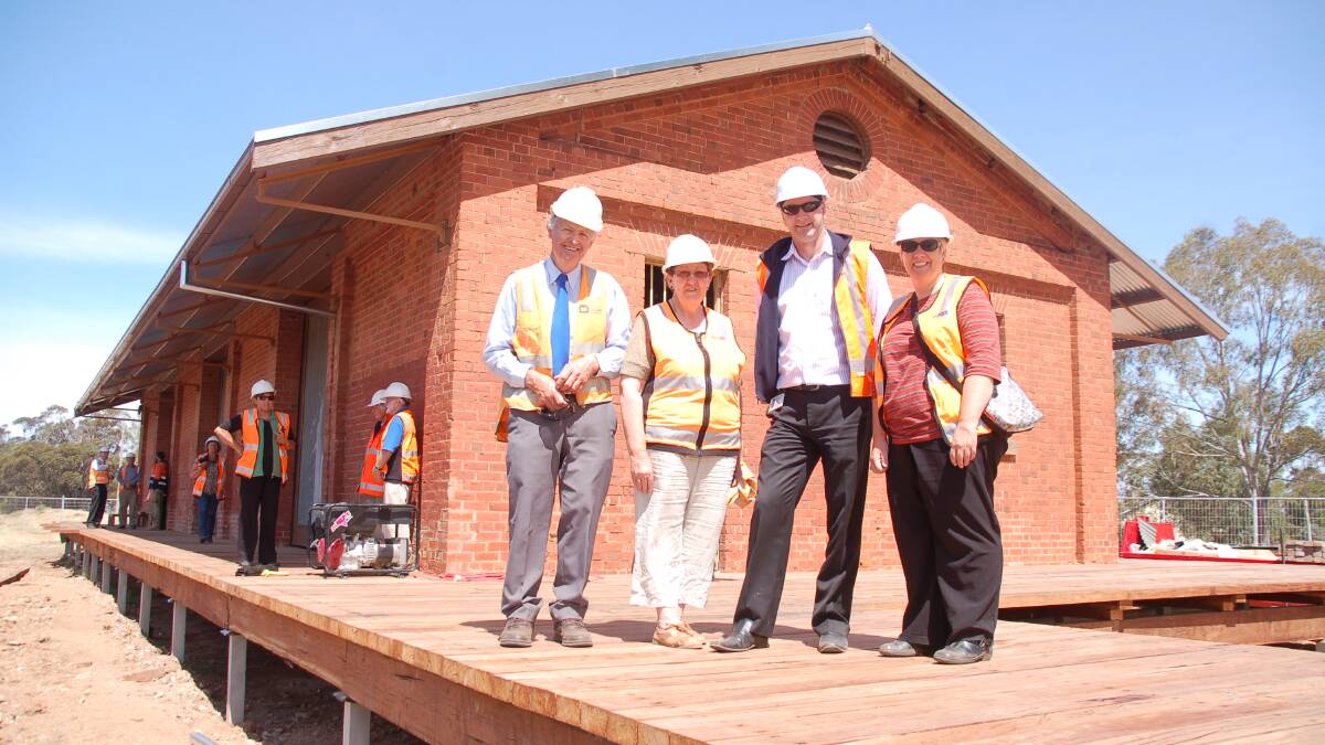 Inglewood and Districts Health Service board member and Goldfields Choir chairman Ian Penny, Cr Colleen Condliffe, IDHS corporate services director Geoffrey Vendy and Workspace Australia chief executive officer Rebecca Dempsey inspected progress at the Inglewood railway station site last week. Picture: ANGUS VERLEY, The Loddon Times