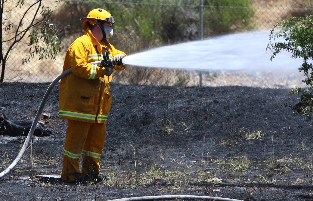 A firefighter blacks out a fire at Golden Gully in December. Strong winds on April 1 have resulted in a Very High fire danger rating. Picture: GLENN DANIELS