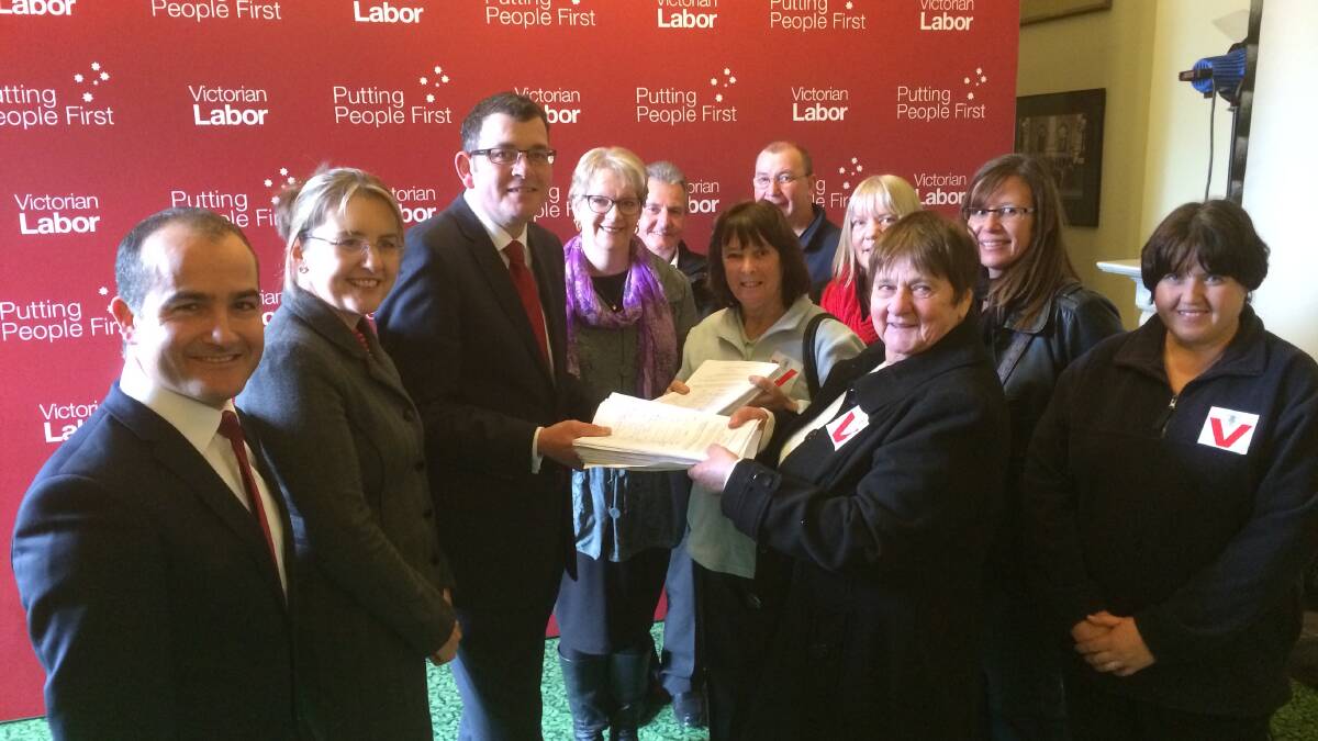 Kalianna Special School representatives present a petition with 4200 signatures to Labor leader Daniel Andrews.