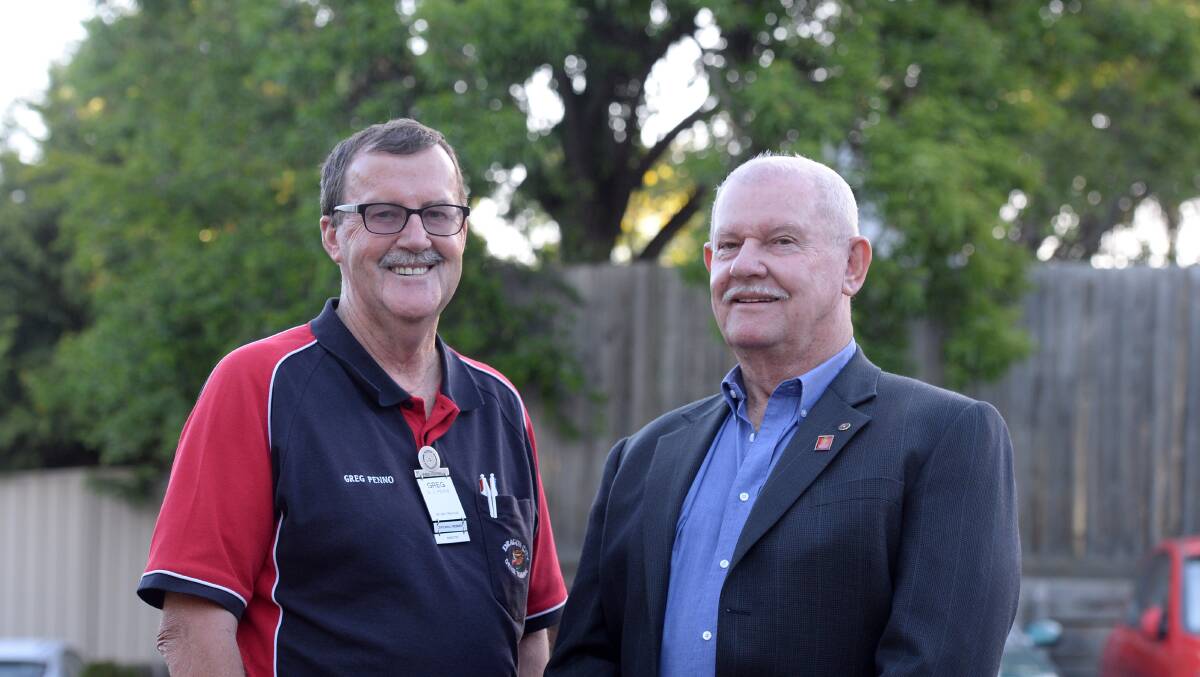 CAUSE: Greg Penno, of the Rotary Club of Bendigo Strathdale, with the president of the Rotary Club of Phnom Penh Peter Gray. Picture: JIM ALDERSEY