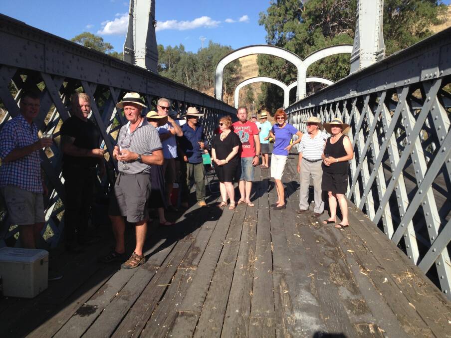 PARTY: Redesdale residents celebrate the town bridge's 147th birthday last Friday.