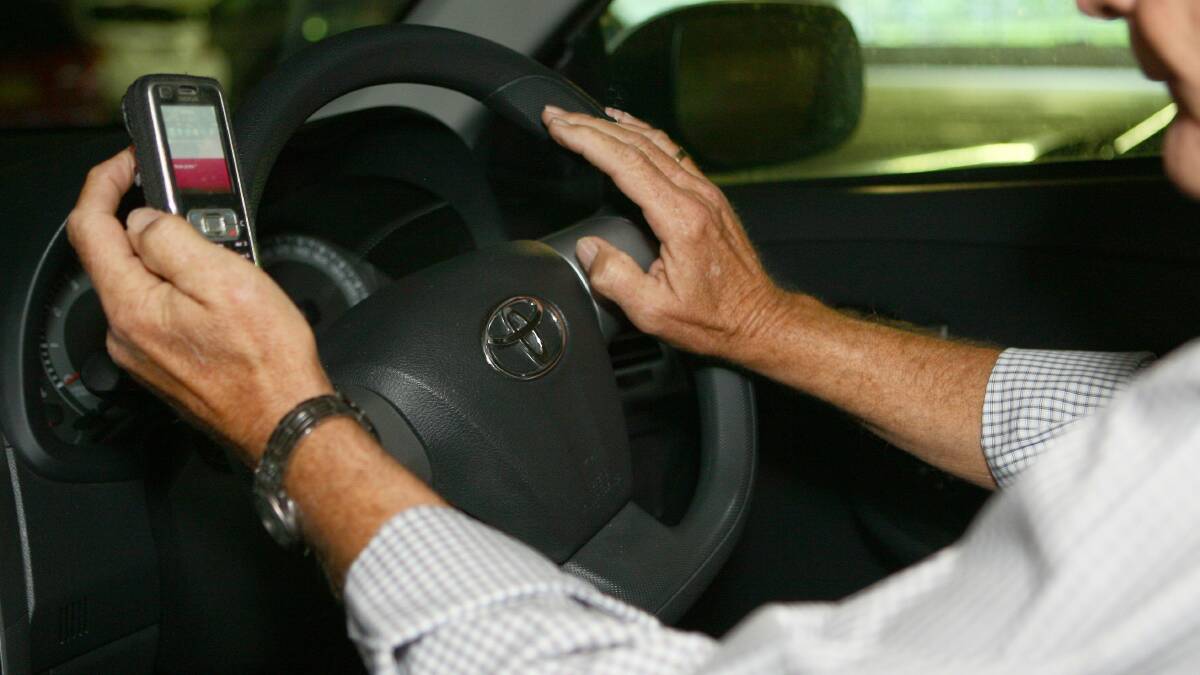 Half of Victorian drivers use phones while driving