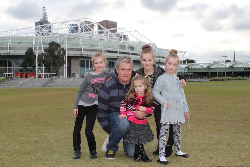 LOVING FATHER: Ian Baker with his daughters Jordan, 7, Jasmine, 3, Jessica, 9 and Jenna ,5.