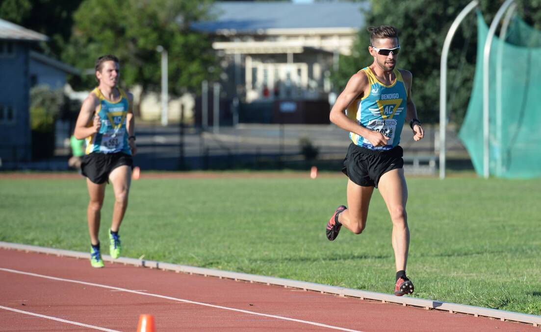 HOT FORM: Brady Threlfall leads Bendigo Harriers clubmate Kye Jenkyn in an earlier round of the Tuesday Night series run by Athletics Bendigo this summer. Picture: JIM ALDERSEY