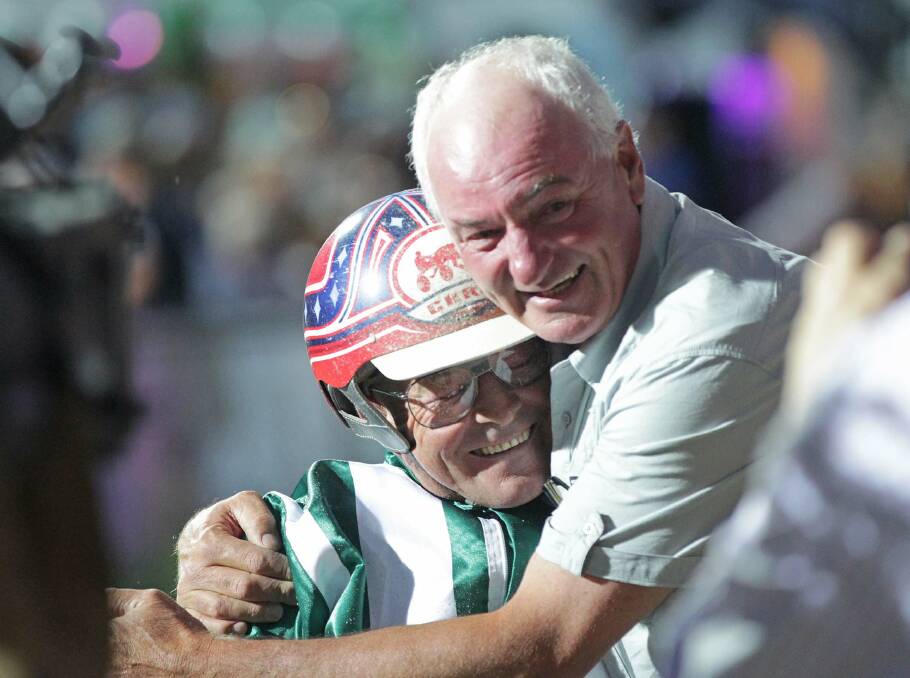 ECSTATIC: Larry Eastman hugs Chris Alford after he drove Menin Gate to victory in the Victoria Derby. Picture: Stuart MCormick 