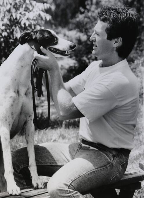 Owner Ken Mills and champion greyhound Barb Wire. 