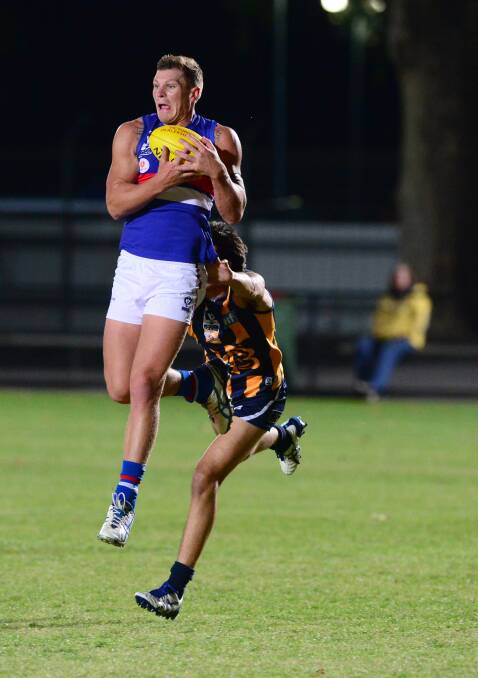 TOO STRONG: Jack Redpath, recruited from Kyneton, marks in the Footscray Bulldogs big win against Bendigo Gold under the Queen Elizabeth Oval lights. Redpath booted three goals for the Dogs. Picture: PETER WEAVING