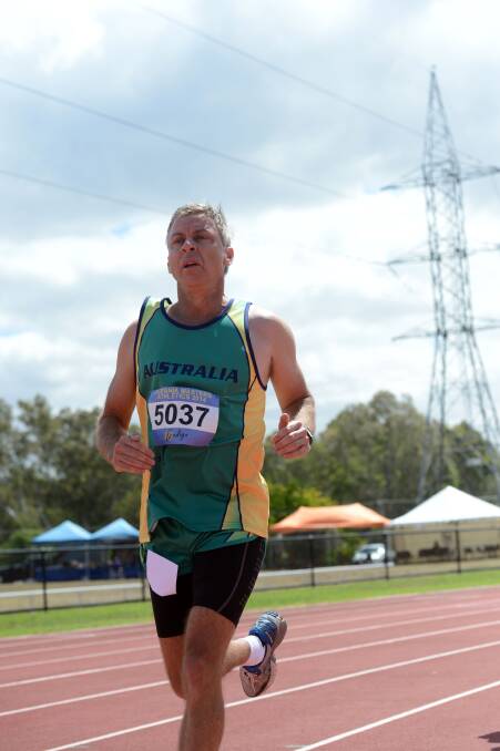 TOUGH RUN: Dave Varley contests the 1500m in the 50-54 years decathlon at the Oceania Masters athletics championships in Bendigo. Picture: LIZ FLEMING 