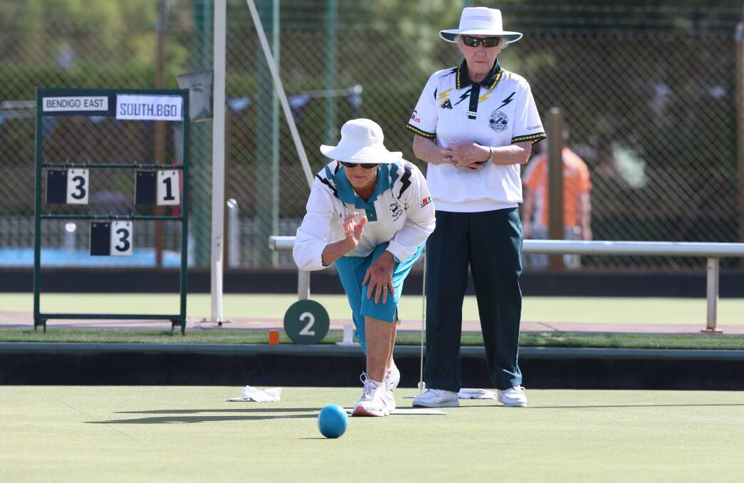 TOP CONTEST: Bendigo East's Joan Judd bowls in the division two match against South Bendigo. Picture: PETER WEAVING