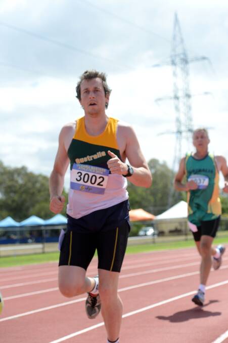FINE RUN: Tasmania's Mathew Brooks runs in the 1500m leg to compete the decathlon at the Oceania Masters athletics championships in Bendigo. Picture: LIZ FLEMING 