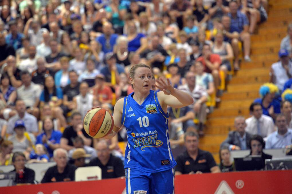 ONE MORE SEASON: Kristi Harrower in action for the Bendigo Spirit in this year's WNBL grand final victory against Townsville Fire at Bendigo Stadium. Picture: BRENDAN McCARTHY