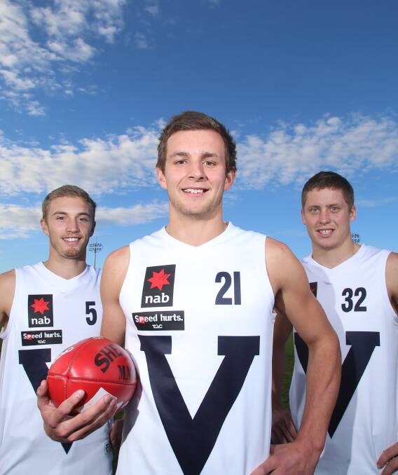 TALENTED TRIO: Billy Evans is flanked by Bendigo Bank Pioneers clubmates Jaden McGrath and Jake Maher. All three are in Victoria Country's squad for the AFL national under-18 championships. Picture: GLENN DANIELS