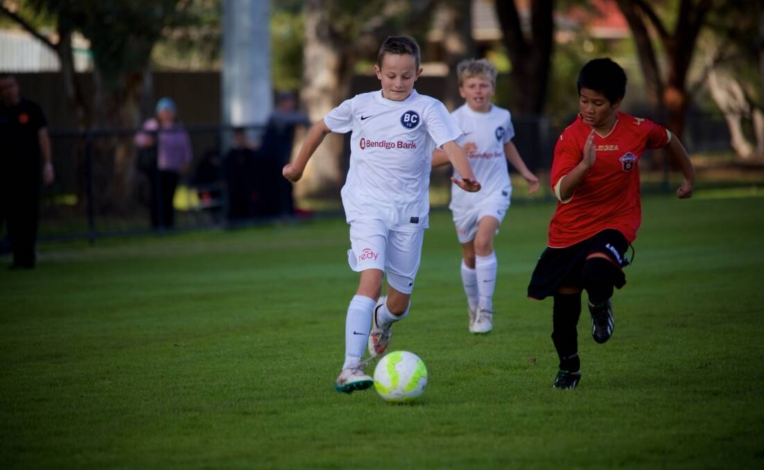 Joshua Bavich attacks for Bendigo City in the under-12s match against Whittlesea Ranges. Picture: CONTRIBUTED
