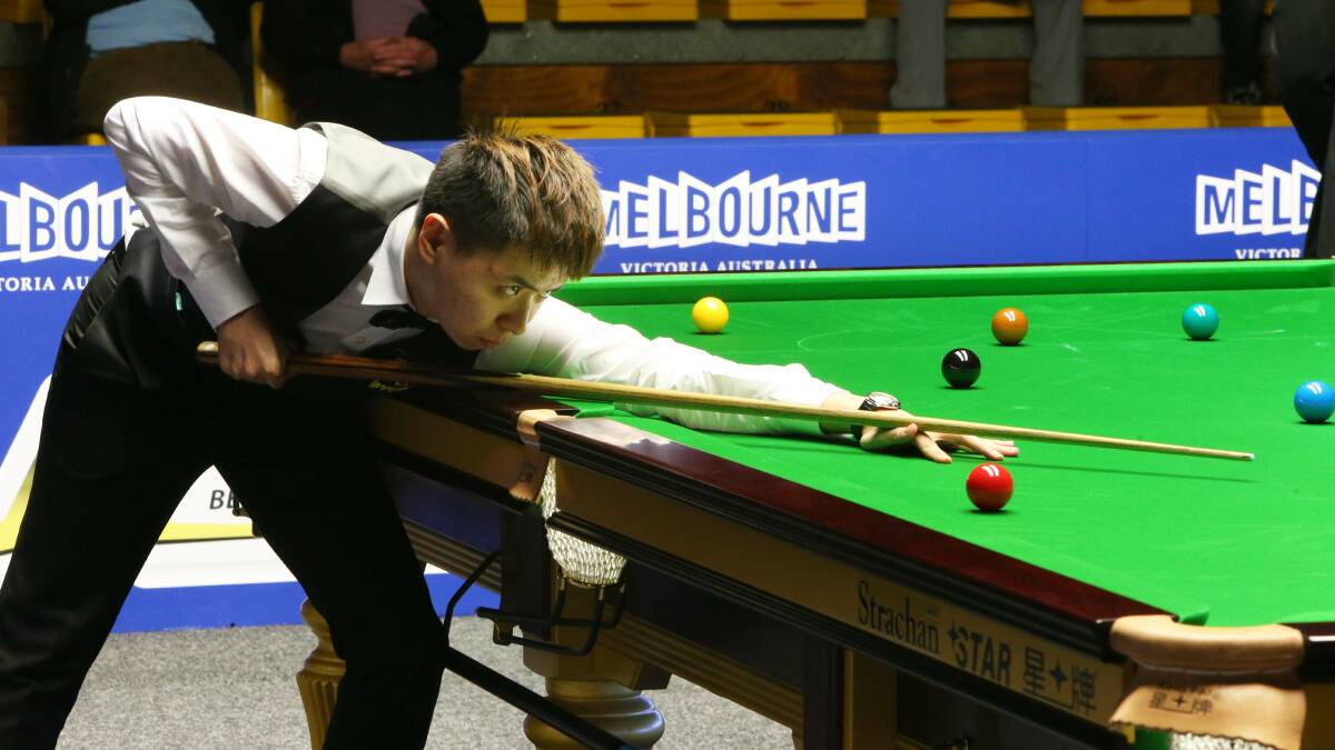China's Xiao Guodong is a picture of concentration in Friday's quarter-final clash with Matthew Stevens at the $500,000 Australian Snooker Goldfields Open at Bendigo Stadium. Picture: PETER WEAVING 
