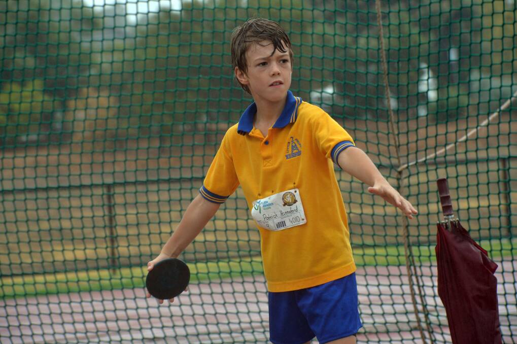 Patrick Hannaford prepares to hurl the discus in the under-9s event. 
