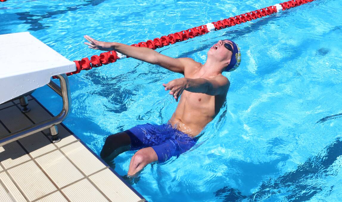 OFF THE BLOCKS: Tyson Jelbart from Bendigo Hawks Swimming Club in action at last month's Sandhurst Division secondary schools swimming titles. Picture: PETER WEAVING