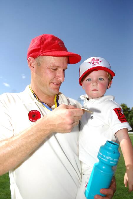 Chris and Will Pinniger after Bendigo United won the BDCA's first XI premiership in 2008. 