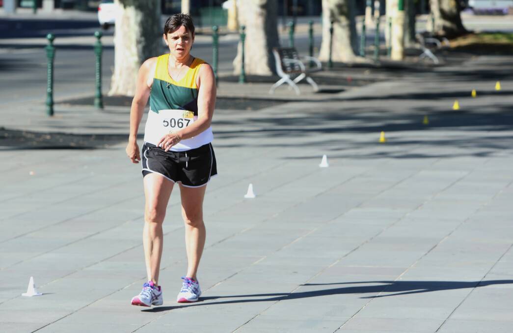 COURAGEOUS: Eaglehawk's Annette Major nears the finish of the 10km walk for the 50-54 years class at the Oceania Masters athletics championships in Bendigo. Picture: PETER WEAVING 
